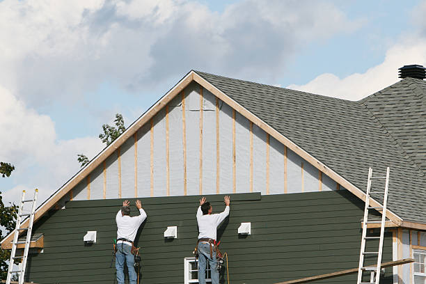 Professional Wood Siding technician working in Freeport, NY